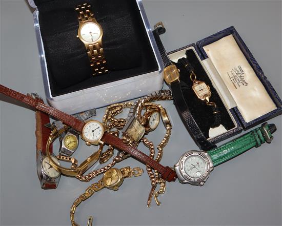 A small group of assorted ladys wrist watches and a watch dial bearing the inscription Rolex.